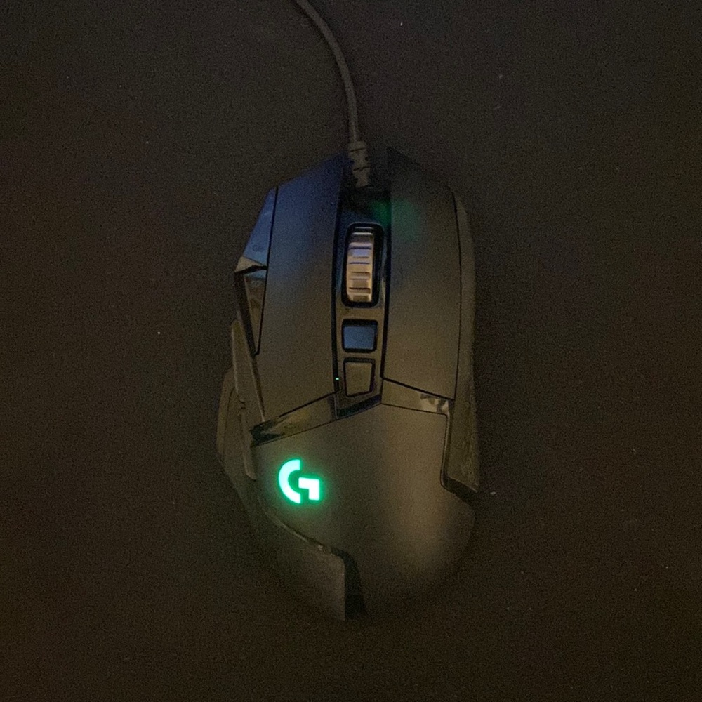 Black(LED lights you can change on the inside) G502 Hero Logitech mouse.